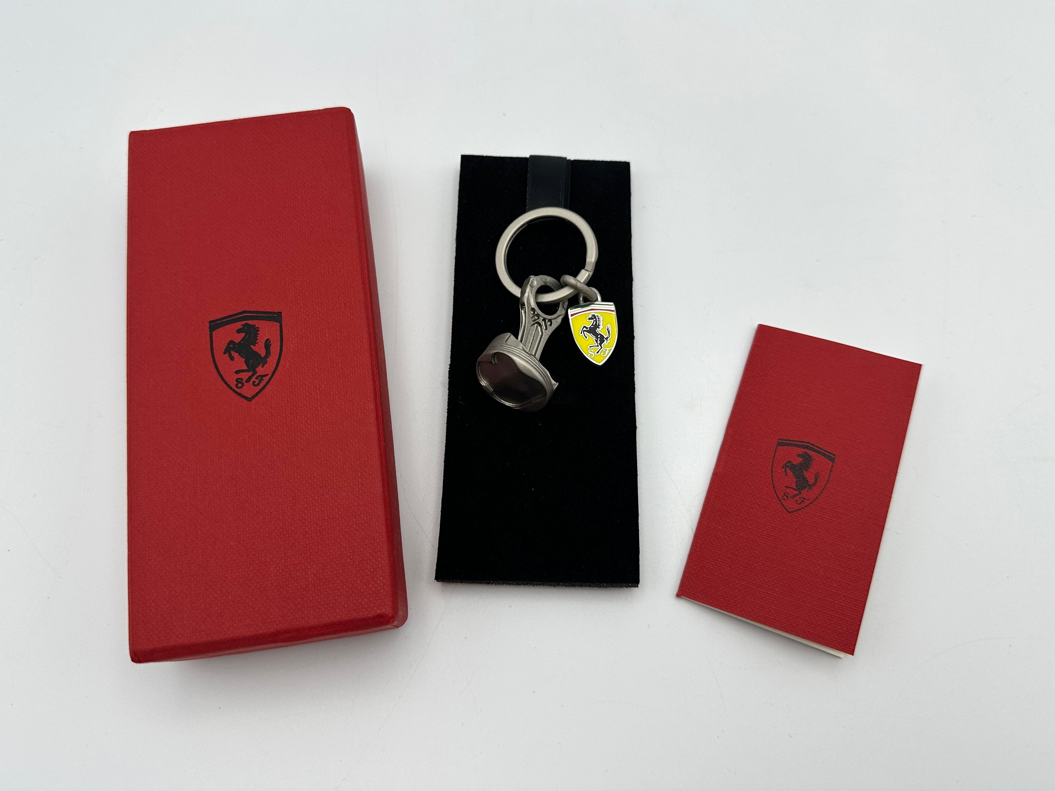 Ferrari F2004 Piston and Shield Logo Keychain, Keyring - Official Accessory