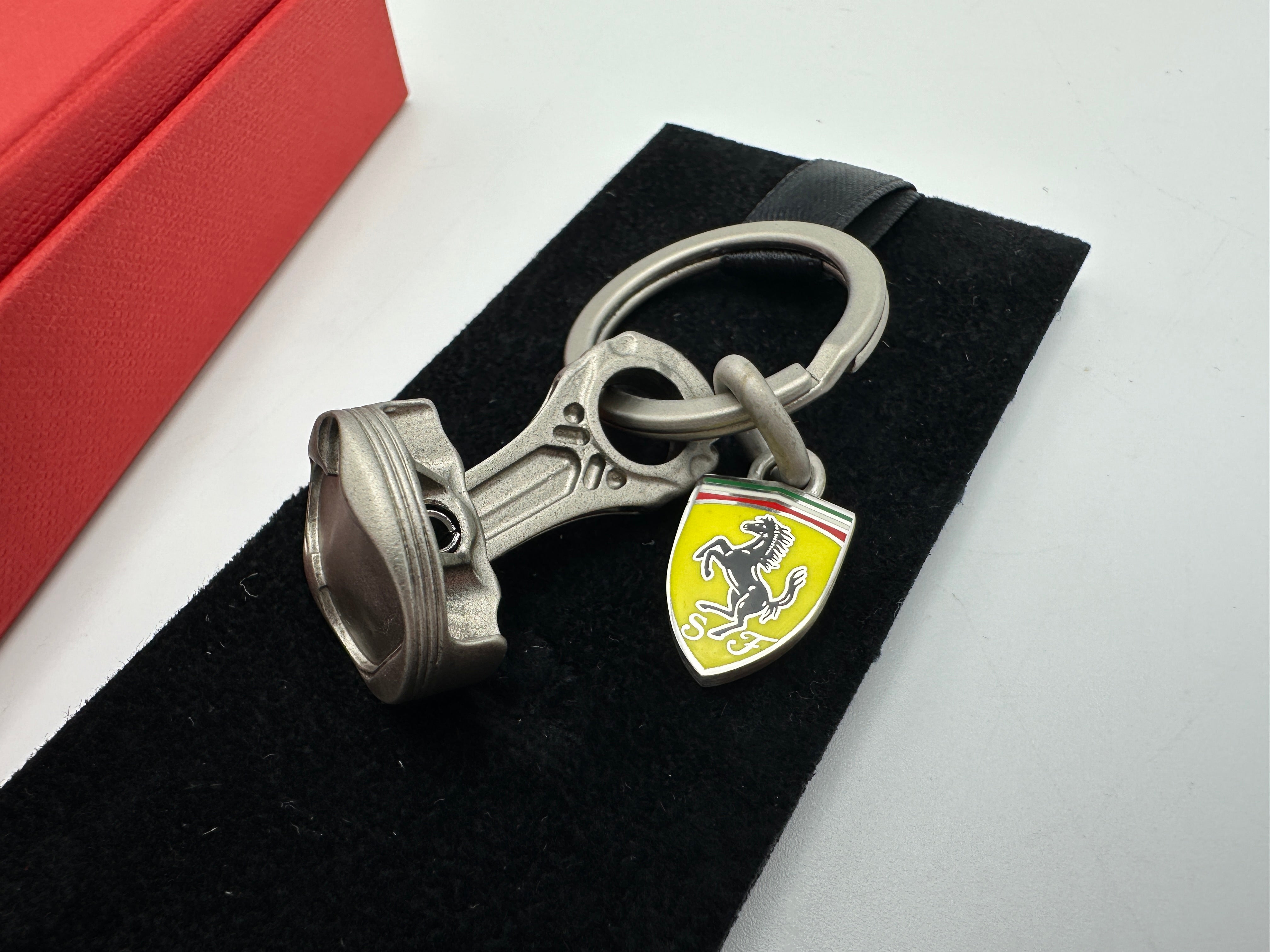 Ferrari F2004 Piston and Shield Logo Keychain, Keyring - Official Accessory