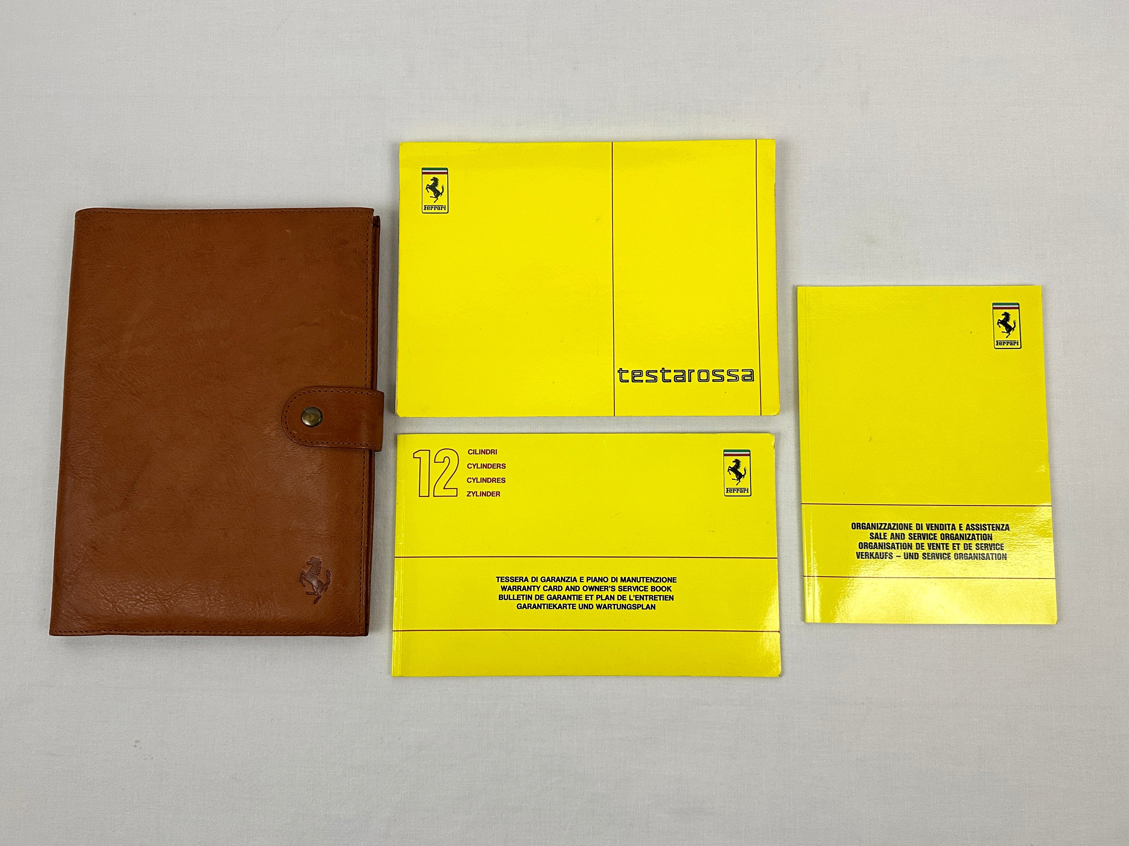 Ferrari Testarossa Schedoni Leather Pouch 1990, Owner’s Manual #585/90, Dealer Directory #584/90, Warranty Card #578/89