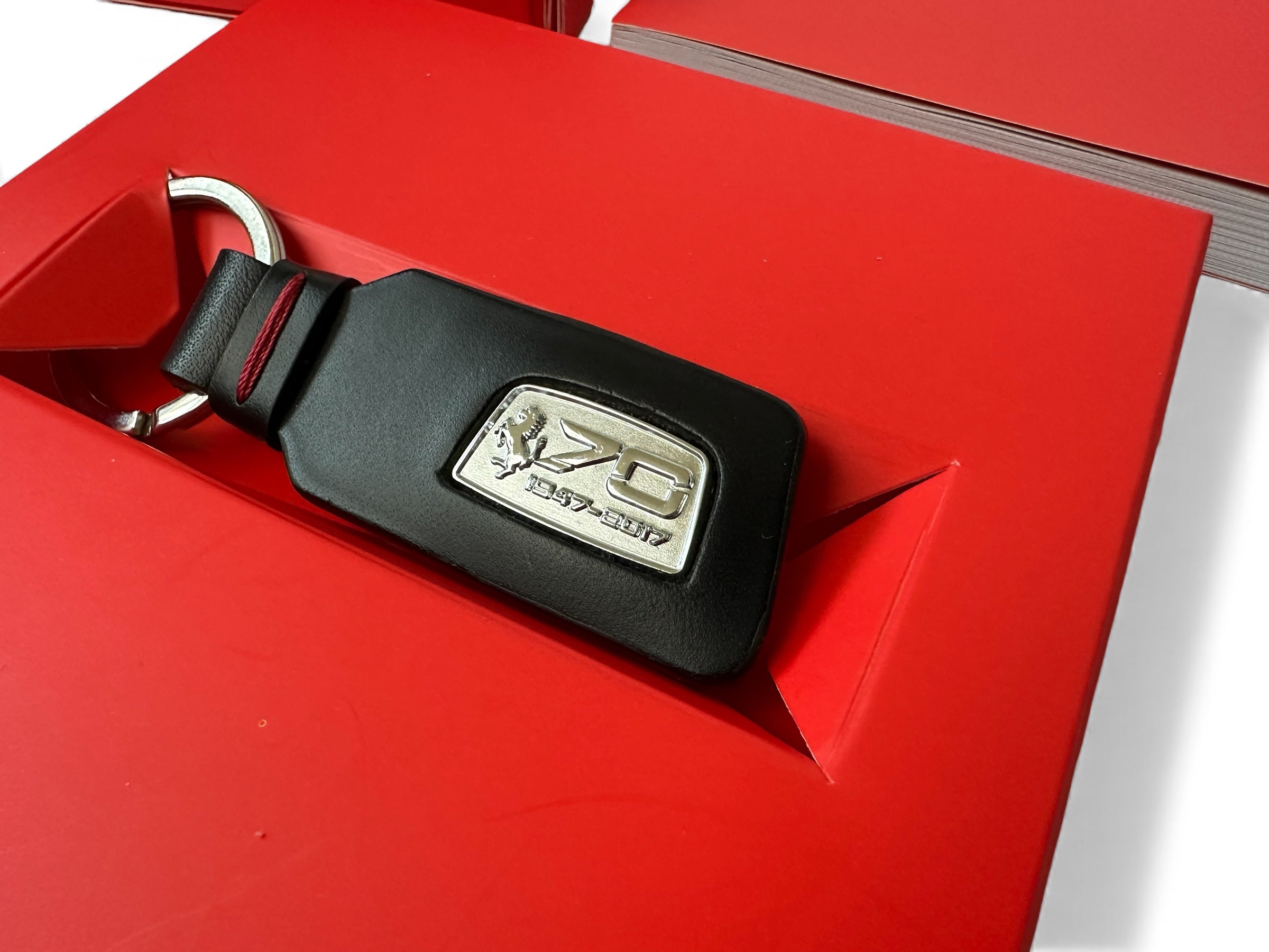 Ferrari 70th Anniversary Black Leather Keychain and Booklet – Official Accessory - 2017